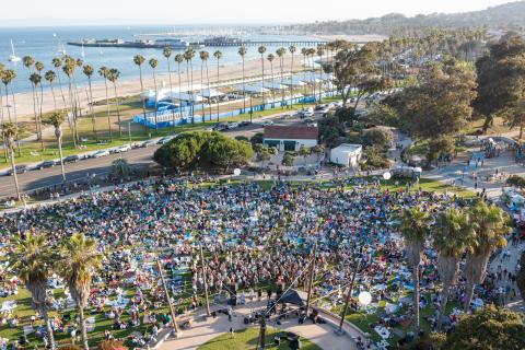 A large crowd gathers for a concert in Chase Palm Park