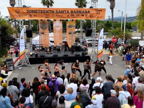 Juneteenth Santa Barbara Block Party, crowd watching a dance performance. 