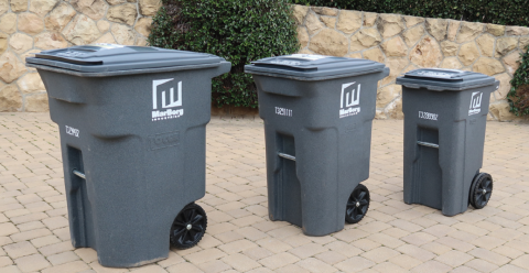 Image of three sizes of grey trash carts with the Marborg logo.