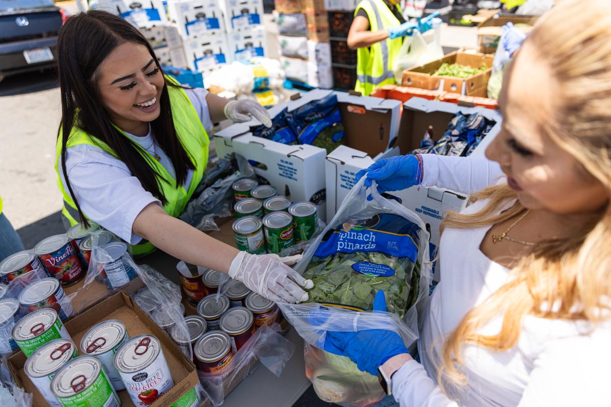 Food distribution volunteers preparing bags