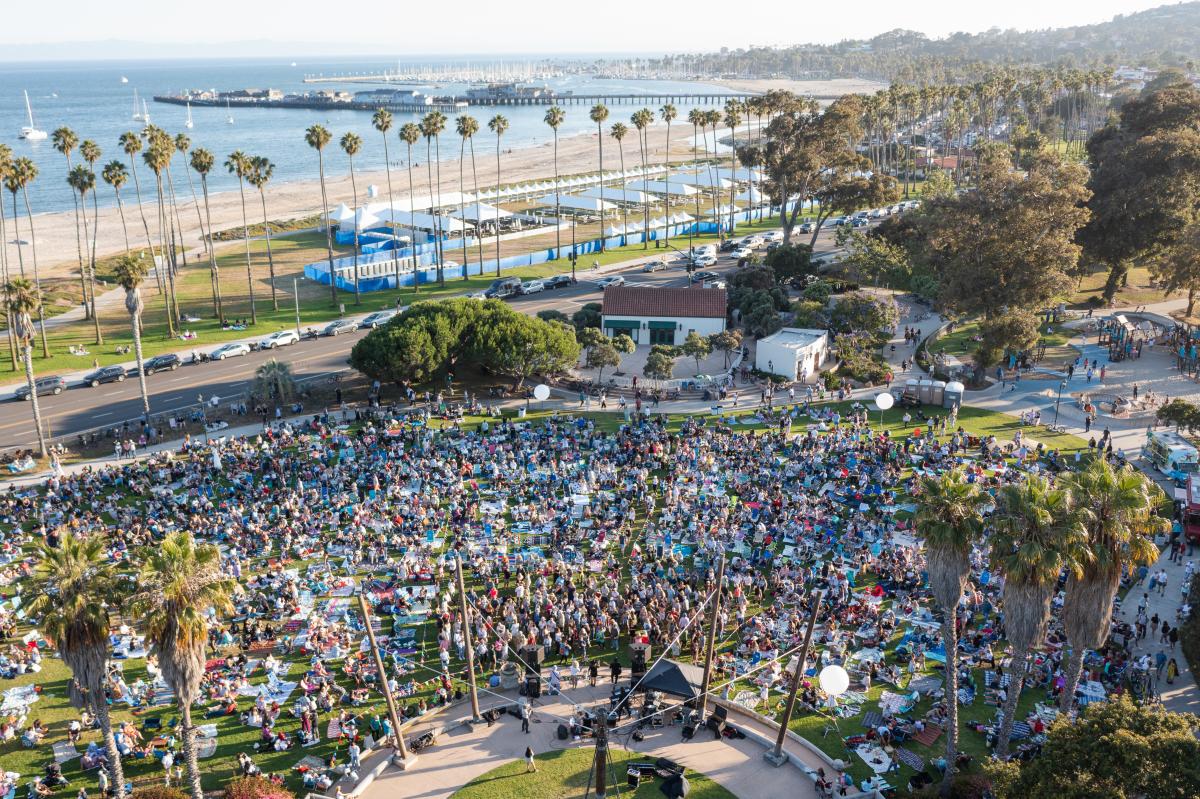 A large crowd gathers for a concert in Chase Palm Park